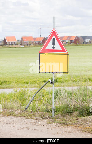 Red and white road traffic warning sign, the Netherlands Stock Photo