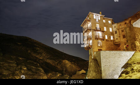 The famous hanging houses at night in Cuenca Stock Photo