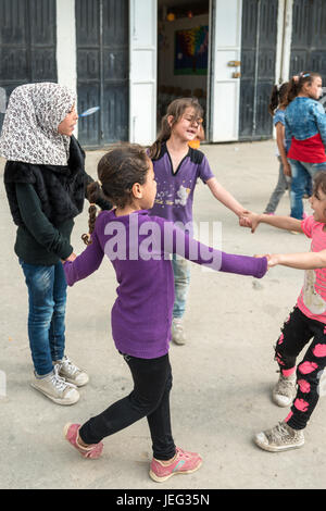 School for Syrian refugees in a garage under apartment building in Minyara, Lebanon. Stock Photo