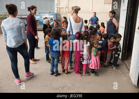 School for Syrian refugees in a garage under apartment building in Minyara, Lebanon. Stock Photo