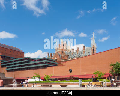 LONDON, UK - MAY 27, 2017: Outside view of the British Library building, national library of the UK, and its concourse with the gothic towers of St Pa Stock Photo