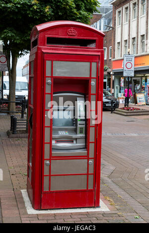 Carlisle, England, UK.  ATM Machine now Occupies an Old  Re-purposed British Telephone Booth. Stock Photo