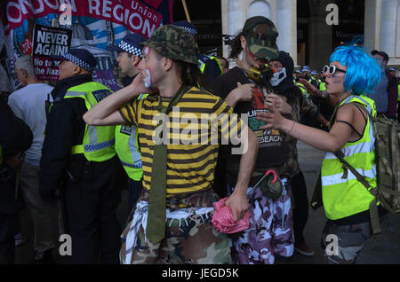 London, UK. 24th Jun, 2017. Clowning against fascism, the troupe explore space and movement in the centre of some what chaotic anti EDL protest . Credit: Philip Robins/Alamy Live News Stock Photo