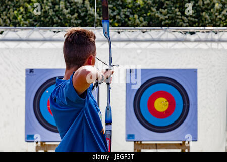Paris, France. 24th Jun, 2017. Man practising archery during the Paris Olympic Games 2024 showcase. Credit: Guillaume Louyot/Alamy Live News Stock Photo
