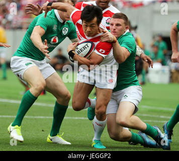 Tokyo, Japan. 24th June, 2017. Japan's Kenki Fukuoka is tackled by Irish players duirng the test match between Japan and Ireland at the Ajinomoto Stadium in Tokyo on Saturday, June 24, 2017. Japan was defeated by Ireland 13-35. Credit: Yoshio Tsunoda/AFLO/Alamy Live News Stock Photo