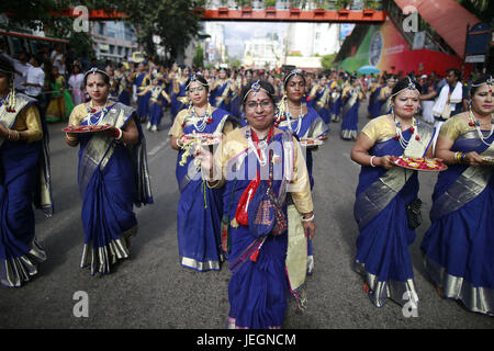 Dhaka, Bangladesh. 25th June, 2017. Bangladeshi Hindu devotees dance during the Rath Yatra, or chariot festival, in Dhaka, Bangladesh, June 25, 2017. Ratha Yatra, also referred to as Rathayatra, Rathjatra or Chariot festival is any public procession in a chariot. Credit: ZUMA Press, Inc./Alamy Live News Stock Photo