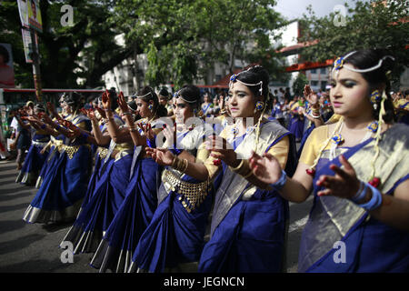 Dhaka, Bangladesh. 25th June, 2017. Bangladeshi Hindu devotees dance during the Rath Yatra, or chariot festival, in Dhaka, Bangladesh, June 25, 2017. Ratha Yatra, also referred to as Rathayatra, Rathjatra or Chariot festival is any public procession in a chariot. Credit: ZUMA Press, Inc./Alamy Live News Stock Photo