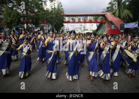 Dhaka, Bangladesh. 25th June, 2017. Bangladeshi Hindu devotees dance during the Rath Yatra, or chariot festival, in Dhaka, Bangladesh, June 25, 2017. Ratha Yatra, also referred to as Rathayatra, Rathjatra or Chariot festival is any public procession in a chariot. Credit: ZUMA Press, Inc./Alamy Live News Stock Photo