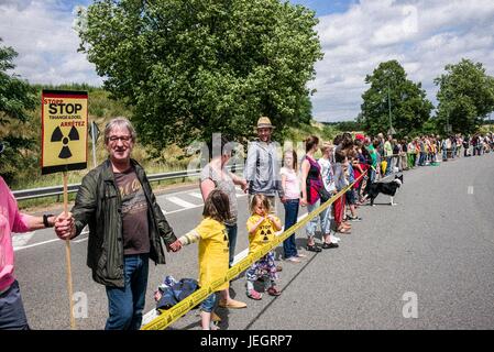 Tihange, Wallonie, Belgium. 25th June, 2017. Belgian, Dutch and German citizens hold the prostest in near the nuclear power plant of Tihange, Belgium on 25.06.2017 Protestors created 90 km long a human chain starting in Tihange, passing by Maastricht in the Netherlands and ending in Aachen, Germany. The organizers of the action demand the immediate shutdown of the nuclear power plants Tihange 2 and Doel 3. by Wiktor Dabkowski Credit: Wiktor Dabkowski/ZUMA Wire/Alamy Live News Stock Photo