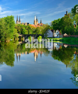 Merseburg Cathedral and Merseburg Castle are reflected in the River Saale, Merseburg, Saxony-Anhalt, Germany Stock Photo