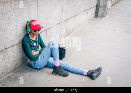 Young Donald Trump fan with MAGA hat Stock Photo