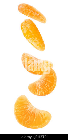 Isolated falling orange segments. Five peeled pieces of orange or tangerine fruit in the air isolated on white background with clipping path Stock Photo