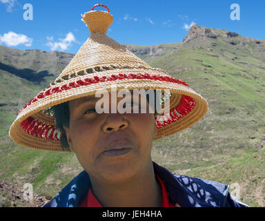 Portrait woman wearing traditional Basotho hat Maloti Mountains Leribe District Lesotho Southern Africa Stock Photo