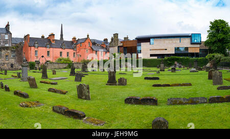 Abbot House  heritage centre on left and new extension to Dunfermline Carnegie Library & Galleries opened May 2017 in Dunfermline, Fife, Scotland, Uni Stock Photo