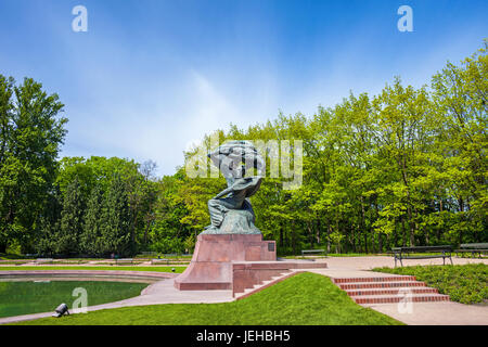 Poland, Warsaw, Royal Lazienki Park in spring and Fryderyk Chopin statue, city landmark Stock Photo