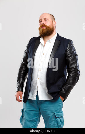 Man with ginger beard in jeans Stock Photo