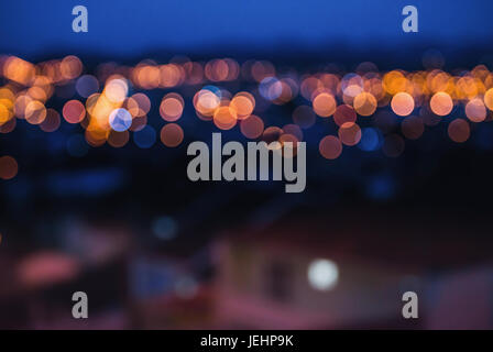 City lights at night with shallow depth of field in blur. Stock Photo