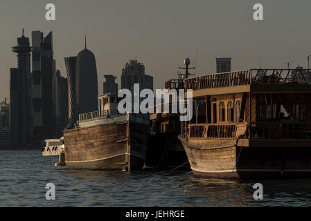 Traditional boats anchored off Doha's corniche. Saudi Arabia and other Arab countries that have cut ties to Qatar. Stock Photo