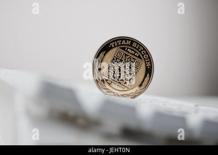 Digital currency physical gold titan bitcoin with QR Code. Stock Photo