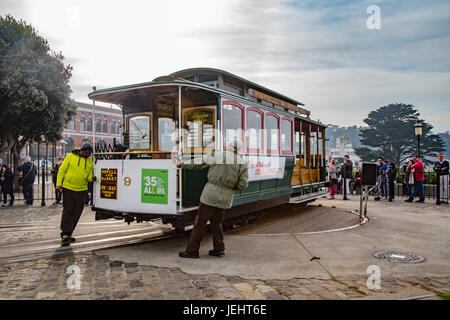 San Francisco, USA - January 8, 2015:  Cable car being turned around on a turning point. Stock Photo