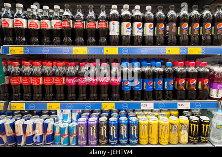 Fizzy drinks on a supermarket shop shelf. Stock Photo