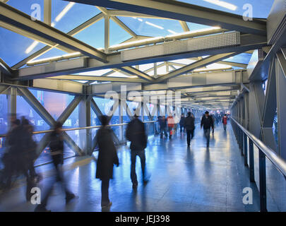 People walking on pedestrian bridge at night, Beijing, China Stock Photo