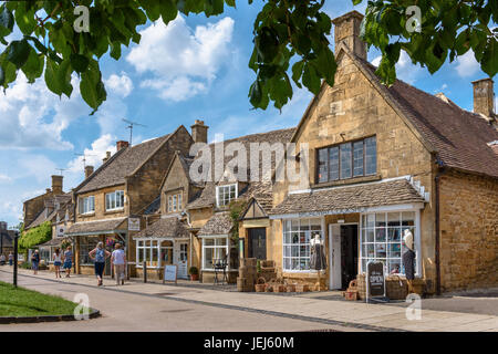 Tourist shops in the Cotswold village of Bourton on the 