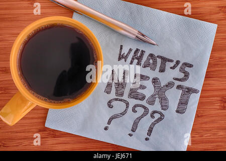 What's next? Handwriting on a napkin. Close up. Stock Photo