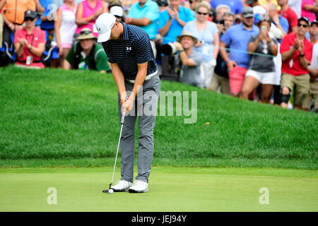 Jordan Spieth putts on the seventh green during the first round of the