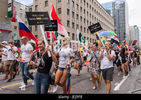 Toronto, Canada. 25 June 2017. People take part in Toronto Pride Parade. Credit: Marc Bruxelle/Alamy Live News Stock Photo