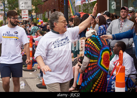 Minneapolis, USA. 25th Jun, 2017. Minnesota's US Senator Al Franken walks in the 2017 Ashley Rukes GLBT Pride Parade and visits with parade goers on June 25 in Minneapolis, Minnesota. Credit: MediaPunch Inc/Alamy Live News Stock Photo