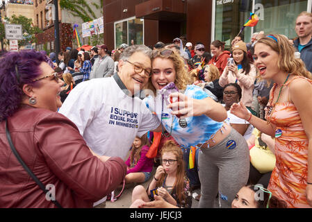 Minneapolis, USA. 25th Jun, 2017. Minnesota's US Senator Al Franken walks in the 2017 Ashley Rukes GLBT Pride Parade and visits with parade goers on June 25 in Minneapolis, Minnesota. Credit: MediaPunch Inc/Alamy Live News Stock Photo