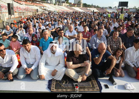 Bucharest, Romania. 25th June, 2017. Muslims celebrating Eid al-Fitr which marks the end of the month of Ramadan, on Dinamo Stadium. Credit: Gabriel Petrescu/Alamy Live News Stock Photo