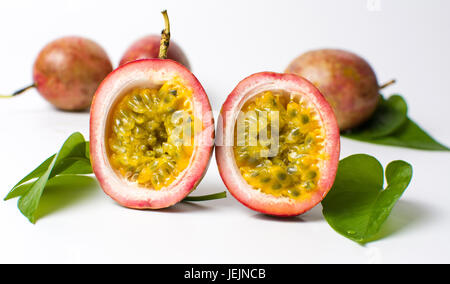 Open passion fruit isolated on white background Stock Photo