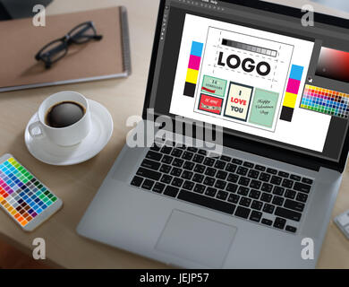 Creative Designer Graphic at work. Color swatch samples, Illustrator Graphic designer working digital tablet and computer Stock Photo