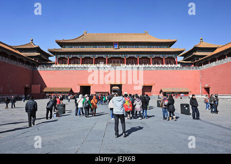 BEIJING-MARCH 10, 2012. Tourists at Palace Museum, China's largest and most complete architectural grouping of ancient halls. Stock Photo