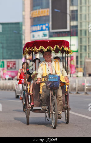 Rickshaw driver and passengers in China town. Thailand S. E. Asia Stock ...