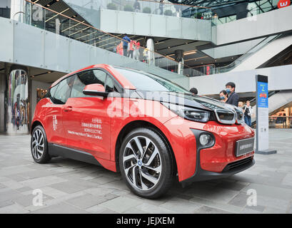 BEIJING-OCT. 19, 2014. BMW i3 in Beijing Taikoo Li shoping area. It is a five-door urban electric car developed by BMW, their first zero emission car. Stock Photo