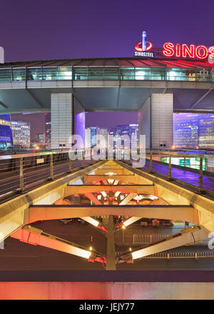 BEIJING-NOVEMBER 14, 2013. Pedestrian bridge at Zhonguancun at night time. With more than 12,000 high-tech enterprises throughout Zhonguancun. Stock Photo