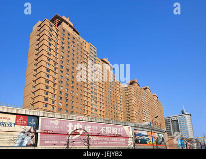 CHANGCHUN – JAN. 31, 2014. Appartment buildings in city center. Chanchun is administered as sub-provincial city with a population of 7,677,089 (2010 c Stock Photo