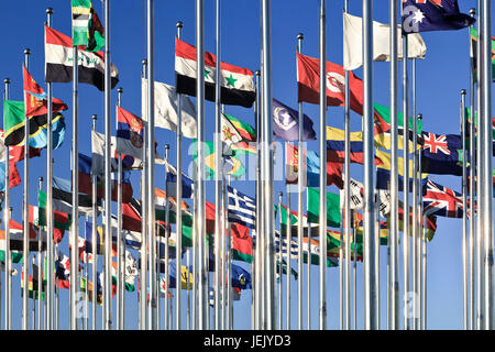 Collection of international flags against a blue sky Stock Photo