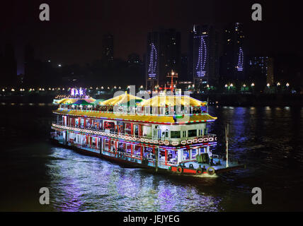 CHONGQING-NOVEMBER. 4, 2014. Tour boat on Yangtze river. Chongqing offers a variety of affordable boat tours on the Yangtze rivers. Stock Photo