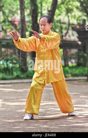 XI’AN-MAY 21. Chinese man practice Tai Chi. Tai Chi Chuan means 'Supreme Ultimate Fist” and is a popular martial art in China practiced for both self  Stock Photo