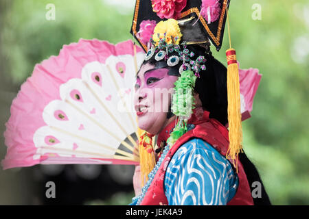 YANGZHOU, CHINA – SEPT. 26, 2010. Chinese opera performance at He Garden. Chinese opera is a form of drama and musical theater with ancient roots. Stock Photo