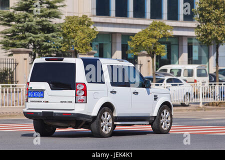 White Range Rover Discovery. Jaguar Land Rover’s sales have soared 23% in the UK, 35% in the rest of Europe and 28% in North America. Stock Photo