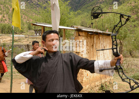 Man practicing national sport of archery, Thimphu, Bhutan, asia Stock Photo