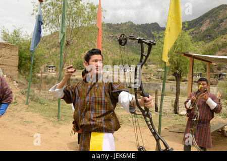 Man practicing national sport of archery, Thimphu, Bhutan, asia Stock Photo