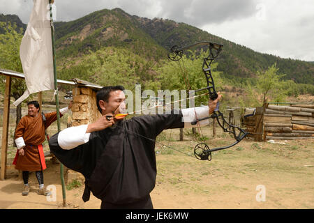 Man practicing national sport of archery, Thimphu, Bhutan, asia Stock Photo