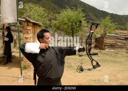 Man practicing national sport of archery, Thimphu, Bhutan, asia Stock Photo