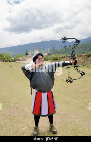 Man practicing national sport of archery, Thimphu, Bhutan, asia Stock Photo